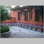 024 A Woman Washing her Clothes at Los Lavanderos.jpg